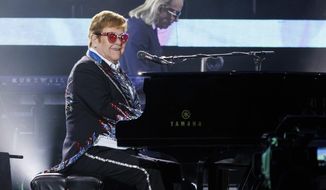 Sir Elton John performs live at the Elton John&#39;s final North American show of his &amp;quot;Farewell Yellow Brick Road&amp;quot; tour on Sunday, Nov. 20, 2022, at the Dodger Stadium in Los Angeles. (Photo by Willy Sanjuan/Invision/AP)
