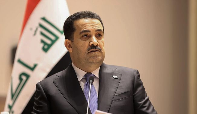This photo provided by Iraqi Parliament Media Office shows Mohammed Shia al-Sudani speaking during the parliamentary session to vote on the new government in Baghdad, Iraq, Oct. 27, 2022. (Iraqi Parliament Media Office via AP) ** FILE **
