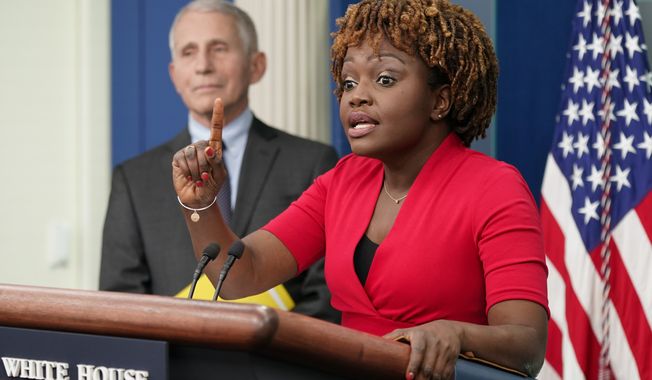 White House press secretary Karine Jean-Pierre speaks alongside Dr. Anthony Fauci, Director of the National Institute of Allergy and Infectious Diseases, during a press briefing at the White House, Tuesday, Nov. 22, 2022, in Washington. (AP Photo/Patrick Semansky)