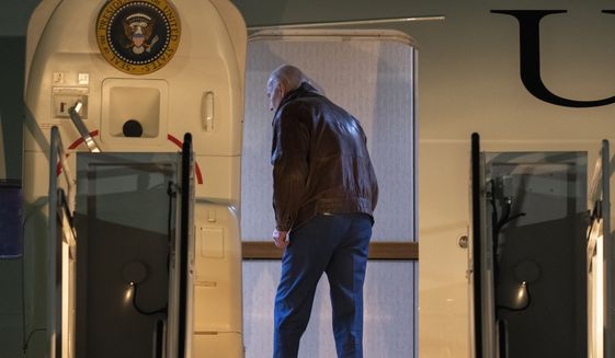President Joe Biden boards Air Force One at Andrews Air Force Base, Md., on Tuesday, Nov. 22, 2022. The president and the first lady are celebrating the Thanksgiving at Nantucket, Mass. (AP Photo/Manuel Balce Ceneta)