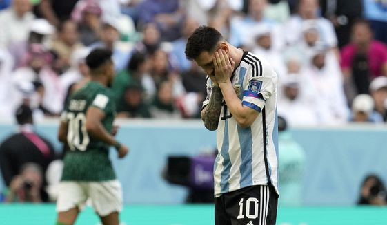 Argentina&#39;s Lionel Messi reacts disappointed during the World Cup group C soccer match between Argentina and Saudi Arabia at the Lusail Stadium in Lusail, Qatar, Tuesday, Nov. 22, 2022. (AP Photo/Natacha Pisarenko)