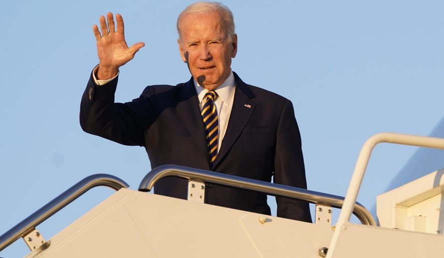 President Joe Biden waves as he boards Air Force One, Monday, Nov. 21, 2022, at Andrews Air Force Base, Md. Biden is traveling to Marine Corps Air Station Cherry Point in Havelock, N.C., to participate in Thanksgiving festivities with members of the military and their families. (AP Photo/Patrick Semansky)