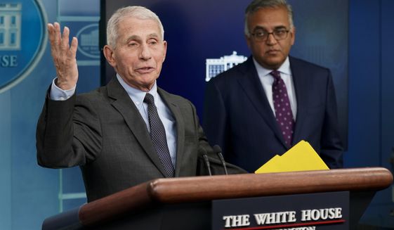 Dr. Anthony Fauci, Director of the National Institute of Allergy and Infectious Diseases, speaks alongside White House COVID-19 Response Coordinator Ashish Jha during a press briefing at the White House, Tuesday, Nov. 22, 2022, in Washington. (AP Photo/Patrick Semansky)
