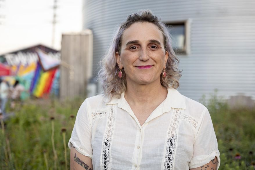 Leigh Finke poses for a photo during her election night party at Bang Brewing in St. Paul, Minn., on Tuesday, Nov. 8, 2022. In Minnesota, Finke became the first openly transgender person elected to the state’s Legislature. (Ben Hovland/Minnesota Public Radio via AP)