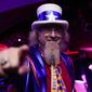 Hector Garcia, 59, of Glendale Heights, Illinois, poses for a photo during an official U.S. Soccer fan party at the FIFA World Club ahead of a group B soccer match between the United States and Wales, in Doha, Sunday, Nov. 20, 2022. He plans to attend 28 games during the 2022 FIFA World Cup. (AP Photo/Ashley Landis)