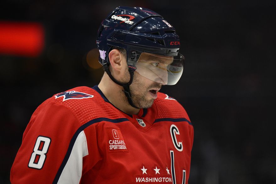 Washington Capitals left wing Alex Ovechkin looks on during the first period of an NHL hockey game against the Philadelphia Flyers, Wednesday, Nov. 23, 2022, in Washington. (AP Photo/Nick Wass)