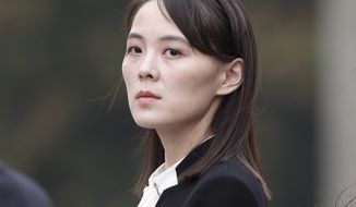 Kim Yo-jong, sister of North Korea&#39;s leader Kim Jong-un, attends a wreath-laying ceremony at Ho Chi Minh Mausoleum in Hanoi, Vietnam, March 2, 2019. Kim Jong-un made insult-laden threats against South Korea on Thursday for considering unliteral sanctions on the North, calling the South’s new president and his government “idiots” and “a running wild dog gnawing on a bone given by the U.S.” (Jorge Silva/Pool Photo via AP, File)