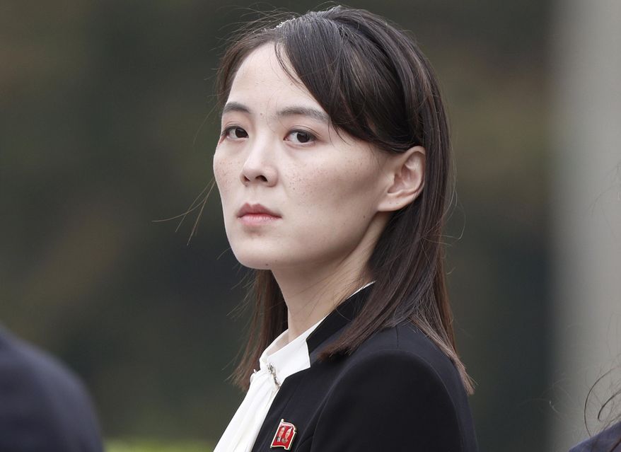 FILE - Kim Yo Jong, sister of North Korea&#39;s leader Kim Jong Un, attends a wreath-laying ceremony at Ho Chi Minh Mausoleum in Hanoi, Vietnam, March 2, 2019. Kim Jong Un made insult-laden threats against South Korea on Thursday for considering unliteral sanctions on the North, calling the South’s new president and his government “idiots” and “a running wild dog gnawing on a bone given by the U.S.” (Jorge Silva/Pool Photo via AP, File)