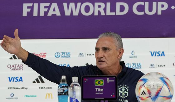 Brazil&#39;s head coach Tite speaks during a press conference on the eve of the group G of World Cup soccer match between Brazil and Serbia, in Doha, Qatar, Wednesday, Nov. 23, 2022. (AP Photo/Andre Penner)