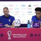 Head coach Gregg Berhalter, left, and Tyler Adams, both of the United States, attend a press conference on the eve of the group B World Cup soccer match between England and the United States, in Doha, Qatar, Thursday, Nov. 24, 2022. (AP Photo/Ashley Landis)
