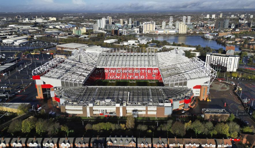 A photograph taken using a drone shows Manchester United&#39;s Old Trafford stadium after owners the Glazer family announced they are considering selling the club as they &amp;quot;explore strategic alternatives&amp;quot;, Manchester, England, Wednesday, Nov. 23, 2022. On Tuesday, the same day the potential sale was annnounced it was also it was also confirmed that Cristiano Ronaldo had left Manchester United by mutual consent. (AP Photo/Jon Super)