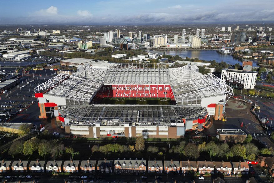 A photograph taken using a drone shows Manchester United&#x27;s Old Trafford stadium after owners the Glazer family announced they are considering selling the club as they &amp;quot;explore strategic alternatives&amp;quot;, Manchester, England, Wednesday, Nov. 23, 2022. On Tuesday, the same day the potential sale was annnounced it was also it was also confirmed that Cristiano Ronaldo had left Manchester United by mutual consent. (AP Photo/Jon Super)