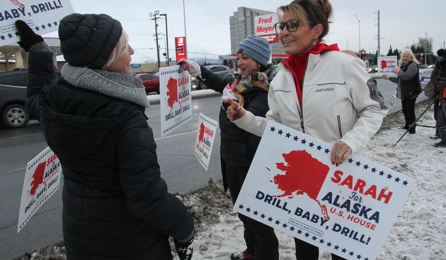 Former Alaska Gov. Sarah Palin, a Republican candidate for Alaska&#39;s sole seat in the U.S. House, meets with supporters waving her signs on Nov. 8, 2022, on a street corner in Anchorage, Alaska. Palin re-emerged in Alaska politics over a decade after resigning as governor with hopes of winning the state&#39;s U.S. House seat. But she struggled to catch fire with voters and ran what critics saw as a lackluster campaign against a breakout Democrat who pitched herself as a regular Alaskan and a Republican backed by state GOP leaders. (AP Photo/Mark Thiessen, File)