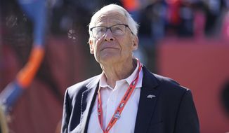 Denver Broncos owner Rob Walton waits for the team&#x27;s NFL football game against the Las Vegas Raiders in Denver on Nov. 20, 2022. Inflation is not going to hurt the bankrolls of sports team owners. In fact, it may help. While the uber-rich will have to pay a little more for their eggs at the grocery store – just like everyone else – inflation is not likely to affect the bottom lines at their sports properties, whether it is yearly revenues or when it comes time to sell. (AP Photo/Jack Dempsey, File) **FILE**