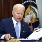 President Joe Biden signs into law S. 2938, the Bipartisan Safer Communities Act gun safety bill, in the Roosevelt Room of the White House in Washington, June 25, 2022. (AP Photo/Pablo Martinez Monsivais, File)
