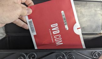 A Netflix DVD envelope is shown on Nov. 17, 2022 in San Francisco.  Subscribers to Netflix’s DVD-by-mail service still look forward to opening up their mailbox and finding one of the discs delivered in the familiar red-and-white envelopes.  (AP Photo/Michael Liedtke)