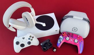 A gift guide to some of the coolest gaming gadgets and games including Microsoft&#39;s Xbox Series S, EPOS&#39; H3Pro Hybrid headphones and GTW 270 earbuds and Scuf&#39;s Reflex FPS controller. (Photograph by Joseph Szadkowski / The Washington Times)