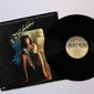 Miami, Fl, USA: Feb 21, 2021: Flashdance movie Original Soundtrack from the Motion Picture on vinyl record LP disc album. Album cover. Photo credit: Bluee77 via Shutterstock.