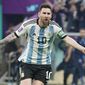 Argentina&#39;s Lionel Messi celebrates after scoring his side&#39;s opening goal during the World Cup group C soccer match between Argentina and Mexico, at the Lusail Stadium in Lusail, Qatar, Saturday, Nov. 26, 2022. (AP Photo/Ariel Schalit)