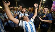 Supporters from Argentina celebrate outside Lusail Stadium following their team&#39;s 2-0 victory over Mexico in a World Cup group C soccer match in Lusail, Qatar, Saturday, Nov. 26, 2022. (AP Photo/Julio Cortez)