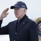 President Joe Biden returns a salute before boarding Air Force One at Nantucket Memorial Airport in Nantucket, Mass., Sunday, Nov. 27, 2022. Biden is heading back to Washington after spending the Thanksgiving Day holiday in Nantucket with family. (AP Photo/Susan Walsh)
