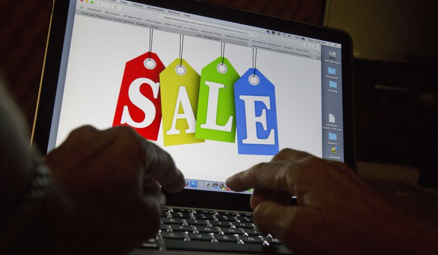 In this Dec. 12, 2016, photo, a person searches the internet for sales, in Miami. Days after flocking to stores on Black Friday, consumers are turning online for Cyber Monday to score more discounts on gifts and other items that have ballooned in price because of high inflation. Adobe Analytics, which tracks transactions for top online retailers, forecasts Cyber Monday will remain the year’s biggest online shopping day and rake in up to $11.6 billion in sales. (AP Photo/Wilfredo Lee)