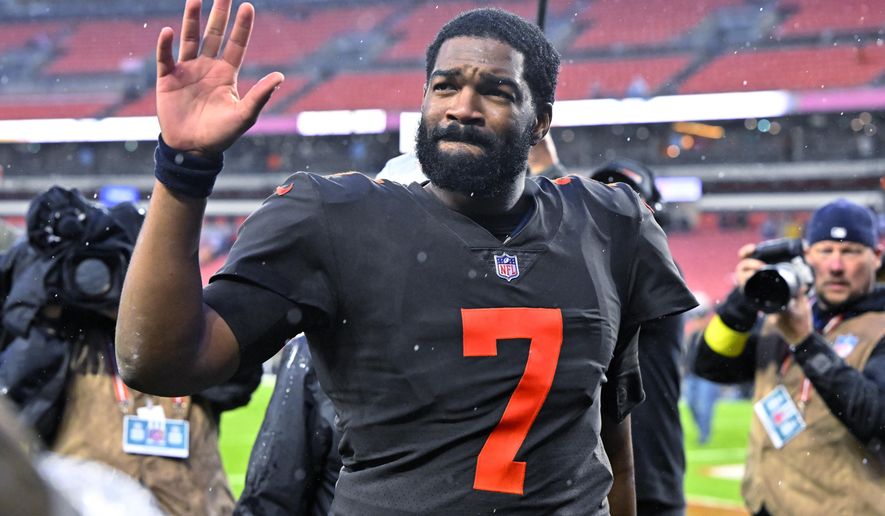 Cleveland Browns quarterback Jacoby Brissett walks off the field following the team&#x27;s 23-17 overtime win over the Tampa Bay Buccaneers in an NFL football game in Cleveland, Sunday, Nov. 27, 2022. (AP Photo/David Richard)