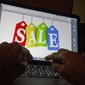 In this Dec. 12, 2016, file photo, a person searches the internet for sales, in Miami. (AP Photo/Wilfredo Lee) ** FILE **