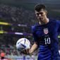 Christian Pulisic of the United States carries a ball during the World Cup group B soccer match between Iran and the United States at the Al Thumama Stadium in Doha, Qatar, Tuesday, Nov. 29, 2022. (AP Photo/Manu Fernandez)