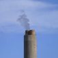A smokestack stands at a coal plant on June 22, 2022, in Delta, Utah. NASA on Tuesday, Nov. 29, announced that its GeoCarb mission, which was supposed to be a low-cost satellite to monitor carbon dioxide, methane and how plant life changes over North and South America, was being killed because of cost overruns. (AP Photo/Rick Bowmer, File)