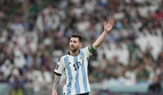 Argentina&#39;s Lionel Messi gestures during the World Cup group C soccer match between Argentina and Mexico, at the Lusail Stadium in Lusail, Qatar, Saturday, Nov. 26, 2022. (AP Photo/Ariel Schalit)