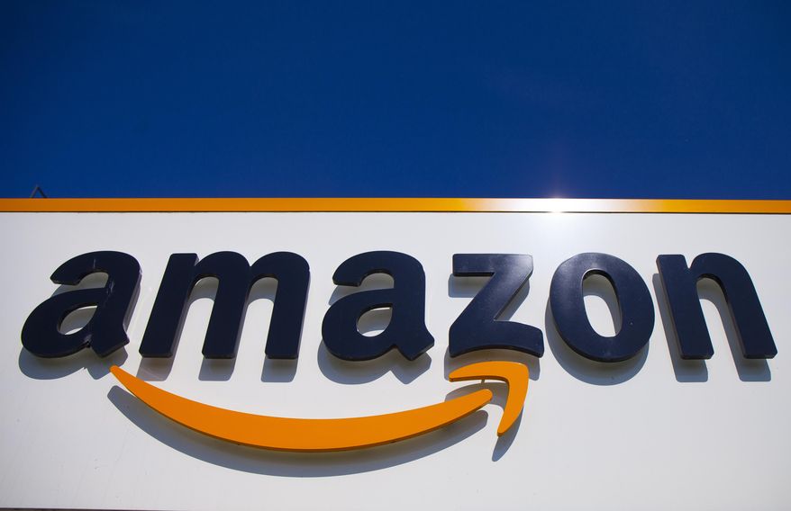 The Amazon logo is seen in Douai, northern France, April 16, 2020. Amazon said Wednesday, Nov. 30, 2022, that it had its biggest Thanksgiving holiday shopping weekend, aided by a record number of consumers looking for deals online amid high inflation. (AP Photo/Michel Spingler, File)