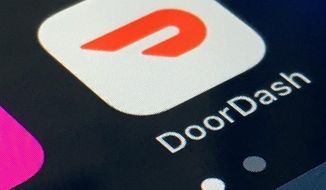 In this Feb. 27, 2020, file photo, the DoorDash app is shown on a smartphone in New York. (AP Photo, File)