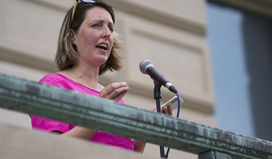 Dr. Caitlin Bernard, a reproductive health care provider, speaks during an abortion rights rally on June 25, 2022, at the Indiana Statehouse in Indianapolis. Bernard, who provided abortion drugs to a 10-year-old rape victim from Ohio, defended her actions before a judge Monday, Nov. 21, 2022, in an episode that drew national attention in the weeks after the U.S. Supreme Court overturned Roe v. Wade. (Jenna Watson/The Indianapolis Star via AP, File)
