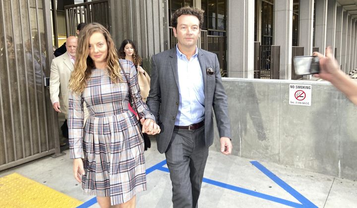 Actor Danny Masterson leaves Los Angeles superior Court with his wife Bijou Phillips after a judge declared a mistrial in his rape case in Los Angeles on Wednesday, Nov. 30, 2022. Jurors said they were hopelessly deadlocked at the trial of &amp;quot;That &#x27;70s Show&amp;quot; actor who was charged with the rape of three women, including a former girlfriend, between 2001 and 2003. (AP Photo/Brian Melley)