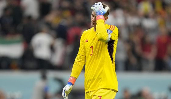 Germany&#39;s goalkeeper Manuel Neuer reacts at the end of the World Cup group E soccer match between Spain and Germany, at the Al Bayt Stadium in Al Khor , Qatar, Sunday, Nov. 27, 2022. The match ended in a 1-1 draw. (AP Photo/Matthias Schrader)