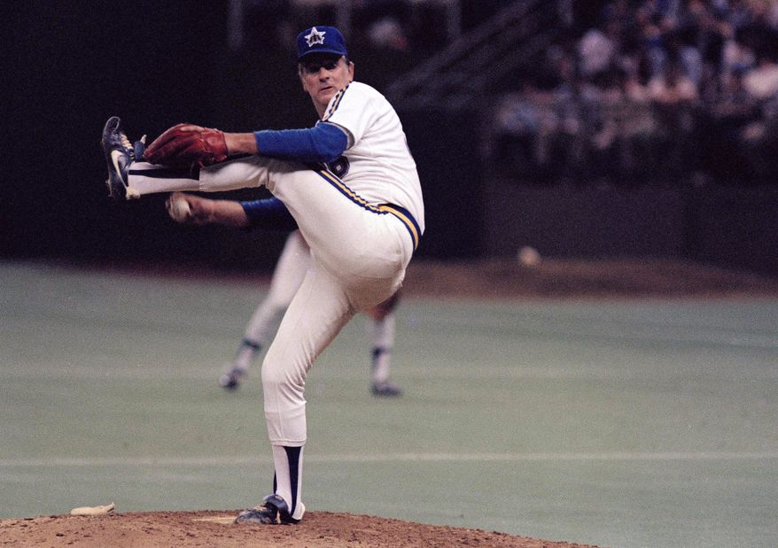 Seattle Mariners pitcher Gaylord Perry throws in his 300th Major League victory, a 7-3 win over the New York Yankees in Seattle, May 6, 1982. Baseball Hall of Famer and two-time Cy Young winner Gaylord Perry, a master of the spitball, died Thursday, Dec. 1, 2022, at his home in Gaffney, S.C. He was 84. (AP Photo/Barry Sweet, File)