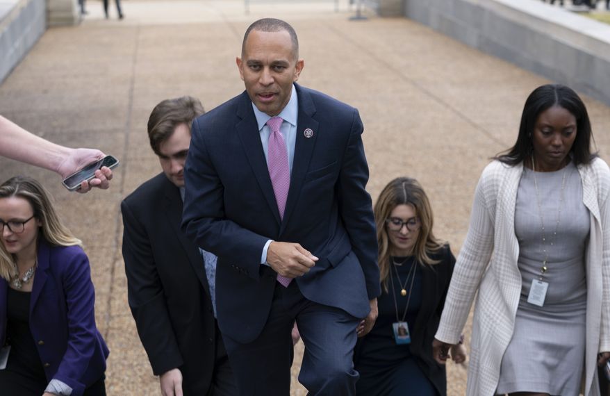 House Democratic Caucus Chair Hakeem Jeffries, D-N.Y., walks to the Capitol in Washington, Wednesday, Nov. 30, 2022, after being elected House Democratic leader to become the first Black American to lead a major political party in Congress. ( AP Photo/Jose Luis Magana)