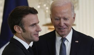 President Joe Biden speaks during a news conference with French President Emmanuel Macron in the East Room of the White House in Washington, Thursday, Dec. 1, 2022. (AP Photo/Susan Walsh)