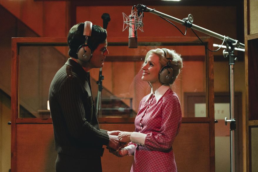 This image released by Showtime shows Michael Shannon as George Jones, left, and Jessica Chastain as Tammy Wynette in a scene from &amp;quot;George &amp;amp; Tammy,&amp;quot; premiering Dec. 4. (Dana Hawley/Showtime via AP)