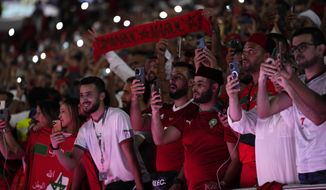 Morocco fans attend the World Cup group F soccer match between Canada and Morocco at the Al Thumama Stadium in Doha , Qatar, Thursday, Dec. 1, 2022. (AP Photo/Manu Fernandez)