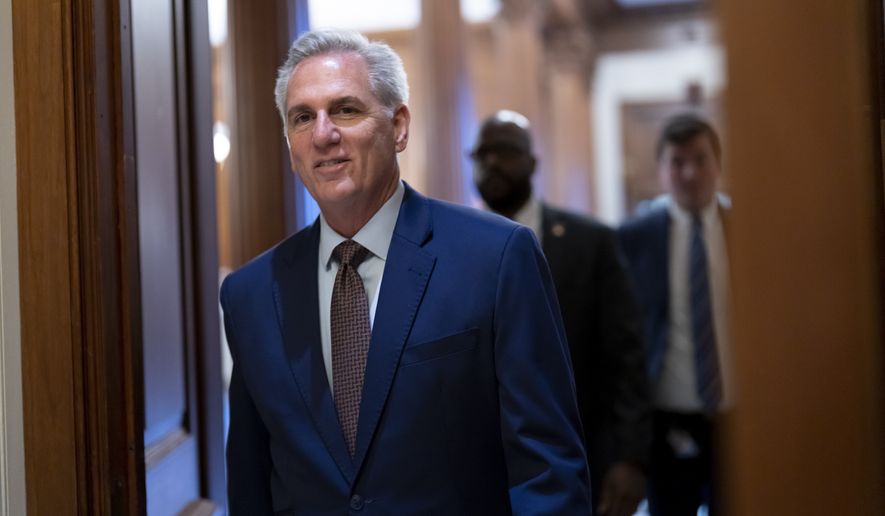 House Minority Leader Kevin McCarthy, R-Calif., walks to the chamber for final votes as the House wraps up its work for the week, at the Capitol in Washington, Friday, Dec. 2, 2022. McCarthy is seeking enough GOP backing to become Democrat Nancy Pelosi&#39;s successor when Republicans take control of the House in the new Congress. (AP Photo/J. Scott Applewhite)
