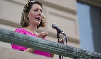 Dr. Caitlin Bernard, a reproductive healthcare provider, speaks during an abortion rights rally on June 25, 2022, at the Indiana Statehouse in Indianapolis. Todd Rokita, Indiana&#39;s Republican attorney general, on Wednesday, Nov. 30, asked the state medical licensing to discipline Bernard, an Indianapolis doctor who has spoken publicly about providing an abortion to a 10-year-old rape victim who traveled from Ohio after its more-restrictive abortion law took effect. (Jenna Watson/The Indianapolis Star via AP, File)
