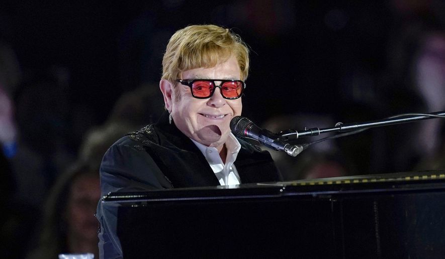 Elton John performs on the South Lawn of the White House in Washington, Friday, Sept. 23, 2022. Elton John is scheduled to perform at the Glastonbury Festival in June, in what organizers say will be his last-ever show in Britain. The festival announced Friday, Dec. 2, 2022 that the star will play the 2023 festival’s final night on June 25 (AP Photo/Susan Walsh, File)