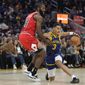 Golden State Warriors guard Jordan Poole (3) changes direction while defended by Chicago Bulls forward Patrick Williams (44) during the first half of an NBA basketball game in San Francisco, Friday, Dec. 2, 2022. (AP Photo/Godofredo A. Vásquez)