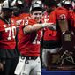 Georgia quarterback Stetson Bennett (13) gestures to the crowd during the trophy presentation the Southeastern Conference Championship football game Saturday, Dec. 3, 2022 in Atlanta. (AP Photo/John Bazemore) **FILE**