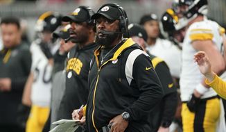 Pittsburgh Steelers head coach Mike Tomlin watches play against the Atlanta Falcons during the first half of an NFL football game, Sunday, Dec. 4, 2022, in Atlanta. (AP Photo/John Bazemore) **FILE**