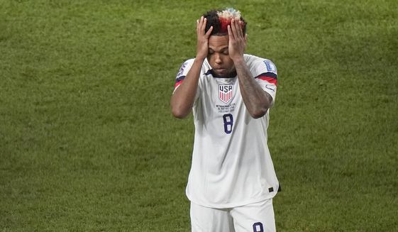 Weston McKennie of the United States leaves the pitch at the end of the World Cup round of 16 soccer match between the Netherlands and the United States, at the Khalifa International Stadium in Doha, Qatar, Saturday, Dec. 3, 2022. The Netherlands won 3-1. (AP Photo/Luca Bruno) **FILE**