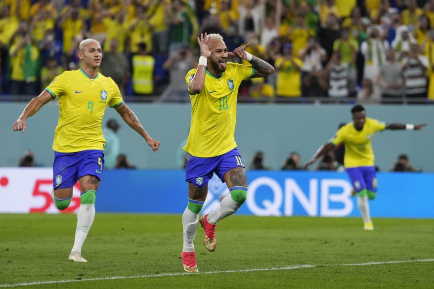 Brazil&#x27;s Neymar celebrates after scoring his side&#x27;s second goal during the World Cup round of 16 soccer match between Brazil and South Korea, at the Education City Stadium in Al Rayyan, Qatar, Monday, Dec. 5, 2022. (AP Photo/Manu Fernandez)