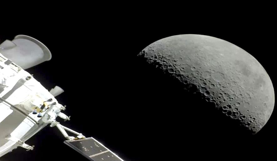NASA&#39;s Orion spacecraft flew past the moon on Monday, December 5, 2022. The crew capsule and its test dummies will aim for a Pacific Ocean splashdown on Sunday, December 11, 2022, off the coast of San Diego after a three-week test flight, setting the stage for astronauts on the next flight in a couple years. (NASA via AP)